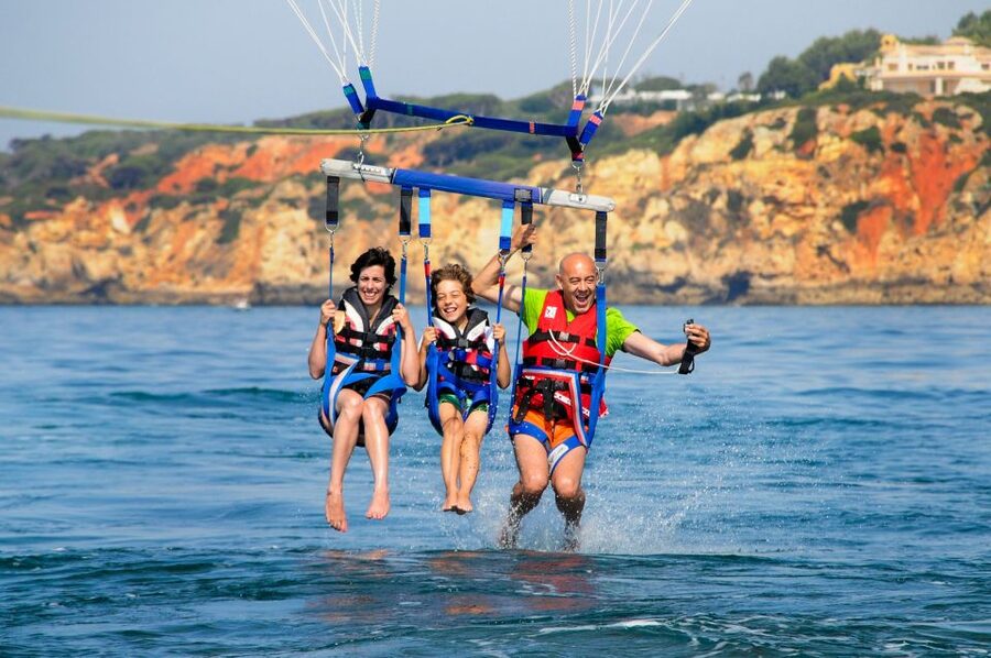 Albufeira: Single, Double or Triple Parasailing Tour - What the crew adds to the experience