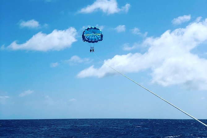 Aruba Parasailing with Unparalleled Views - Choosing Single, Tandem, or Triple Flight