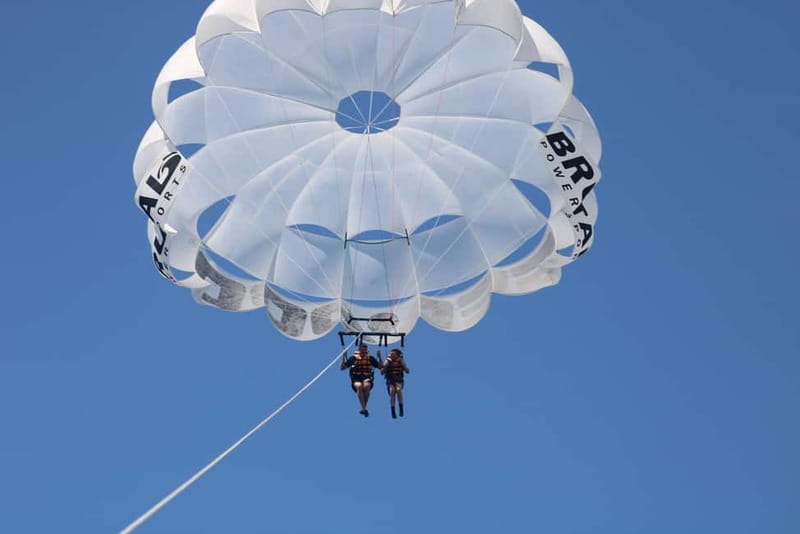 Barcelona: Parasailing magic flight and views above the sea - Languages, flexibility, and weather concerns