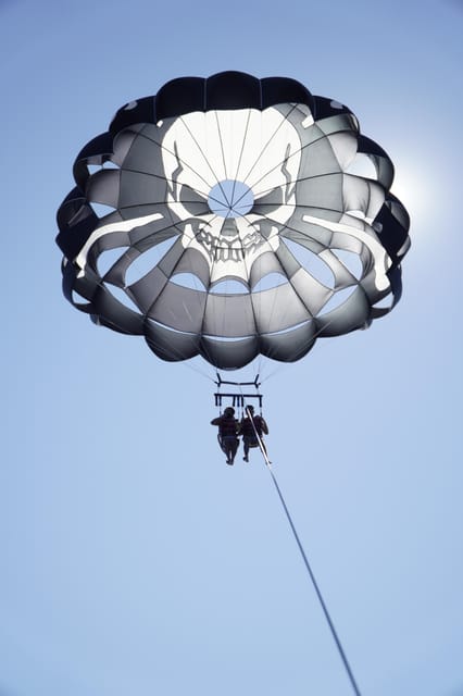 Barcelona: Parasailing with 360º Panoramic Skyline Views - Staff, languages, and the booking record