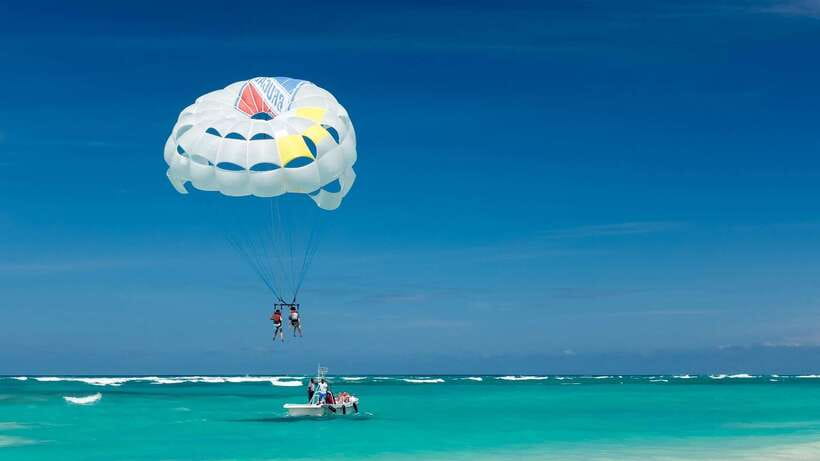 Boracay: Solo or Tandem Parasailing Experience - Leaving White Beach for the floating station