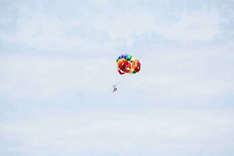 Boracay: Solo or Tandem Parasailing Experience - Getting fitted for the parasail