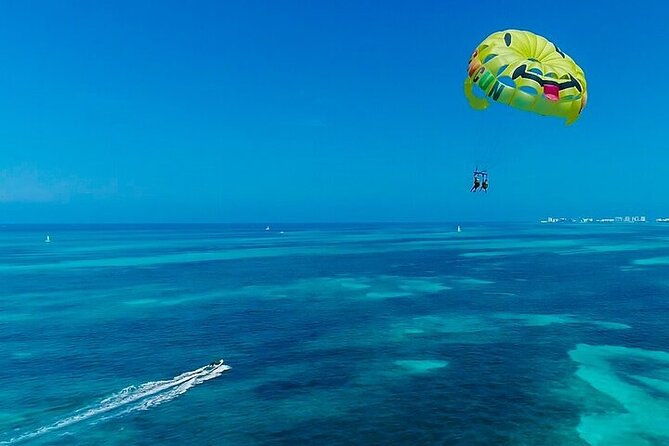Cancun Combo Adventure: 4 Reef Snorkeling Stops & Parasailing - How the timing affects the value