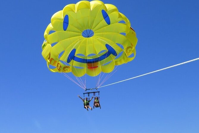 Cancun Combo Adventure: 4 Reef Snorkeling Stops & Parasailing - Parasailing above Cancun’s coast