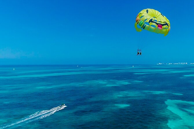 Cancun Combo Adventure: 4-Reef Stop Snorkeling and Parasail Ride - Gear, towels, lockers, and the safety patrol