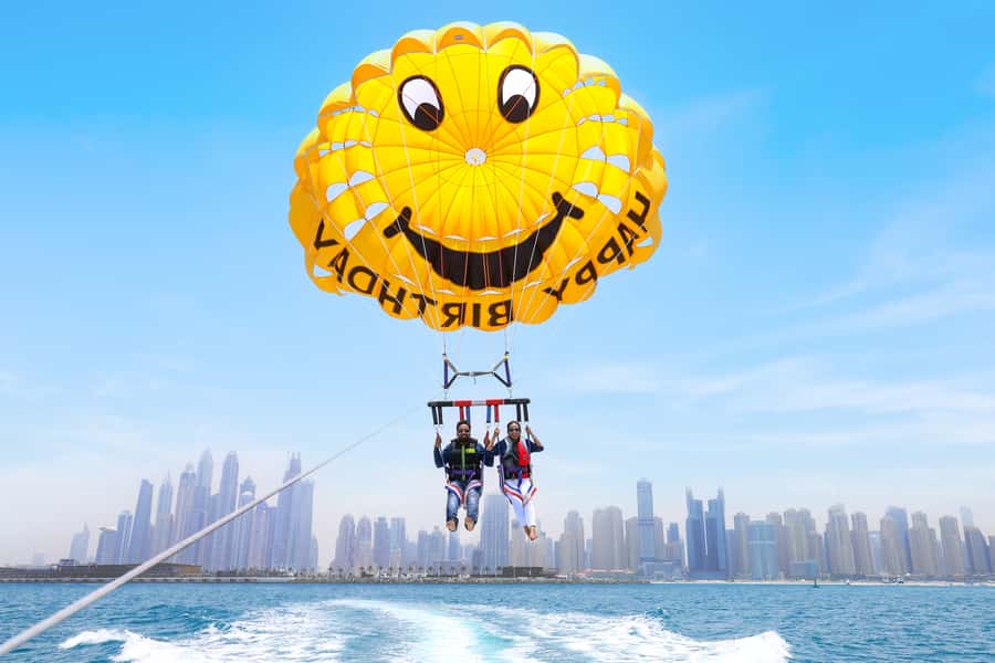 Dubai: Parasailing with Happy birthday Parachute JBR & Palm - The safety briefing and gear setup