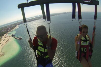 Fly Above Cancun Bay: Parasailing Experience