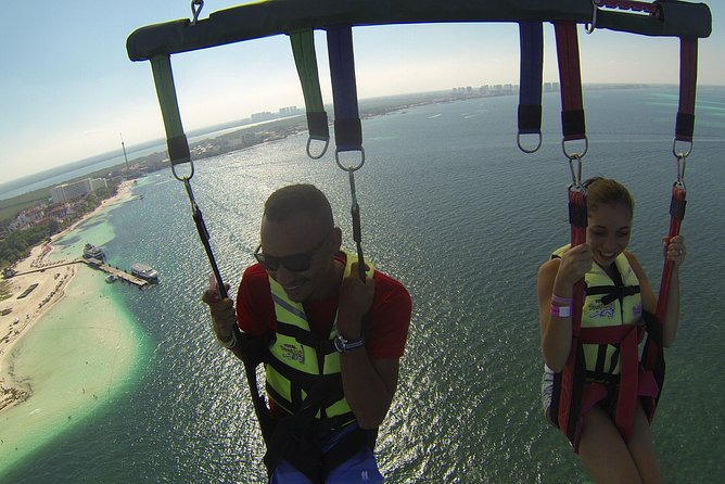 Fly Above Cancun Bay: Parasailing Experience - The $20 dock fee changes the real price