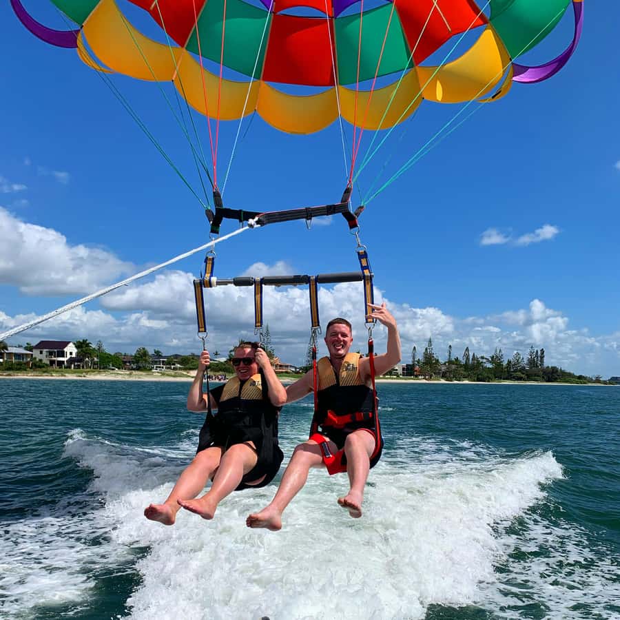 Gold Coast: Surfers Parasailing with Free Photos - Staying Dry or Taking a Gentle Dip
