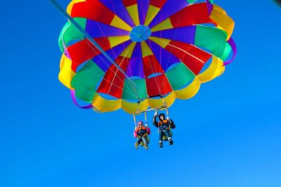 Surfers Parasailing with Free Photos