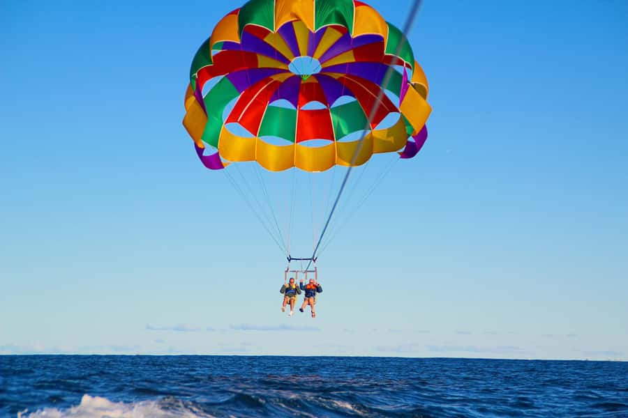 Gold Coast: Surfers Parasailing with Free Photos - The Crew Sets the Tone