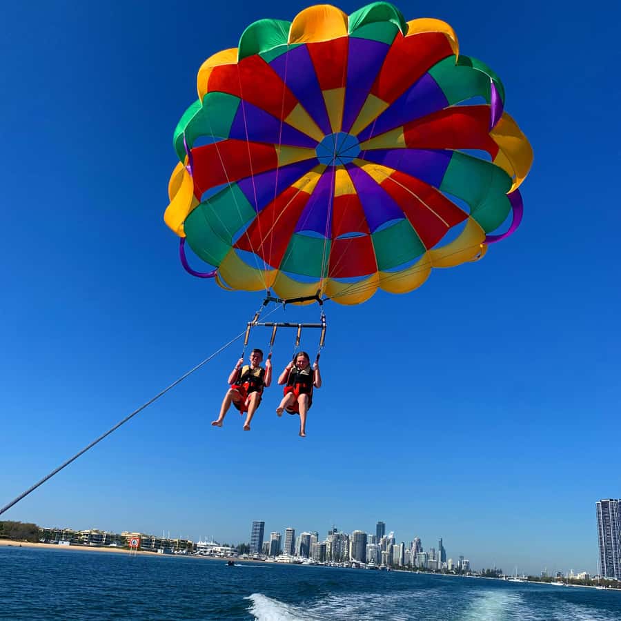 Gold Coast: Surfers Parasailing with Free Photos - Weather and Wind Can Change the Plan