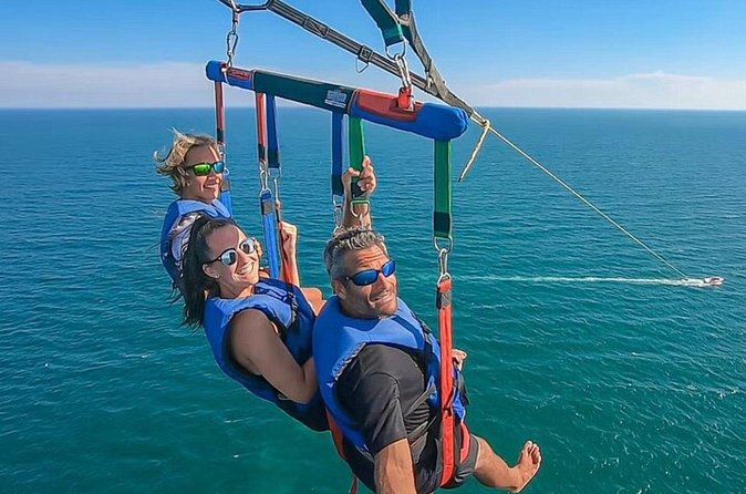 Jetski and Parasailing w/ Entry & Private Transportation - Parasailing brings the quieter half
