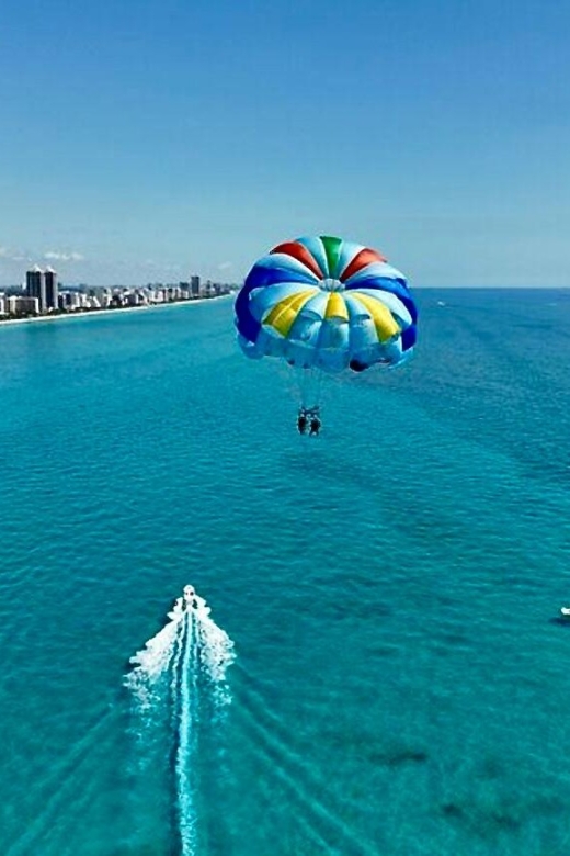 Miami Beach: Parasailing Boat Tour in South Beach - Getting fitted on the boat platform