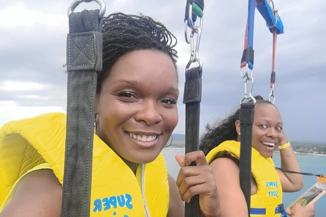 Negrils Seven Miles Beach, Rick's cafe and Parasailing Tour. - What the day feels like for different types of people