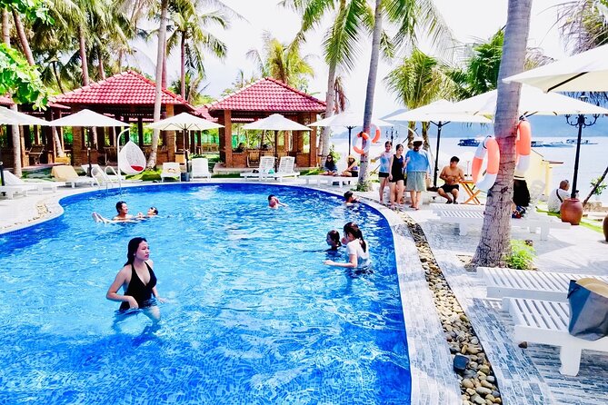 Nha Trang Island Tour Plus Parasailing Included Lunch - Coral Bay: foam, music, and a swimming pool