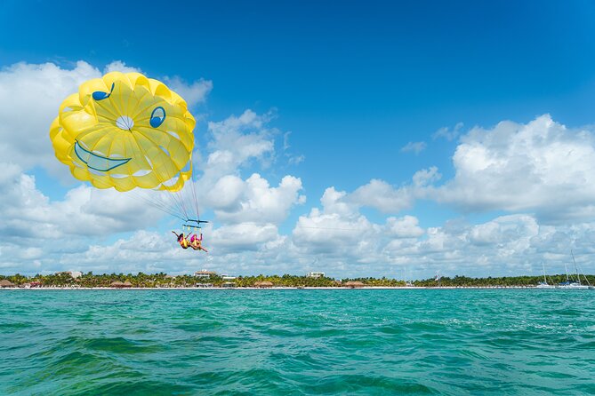 Parasailing & Beach Club with Transportation In Riviera Maya - Why the crew matters for first-time flyers
