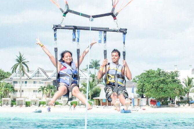 Parasailing, Blue Hole Mineral Spring, Seven Mile Beach - The Blue Hole Mineral Spring is the unusual stop