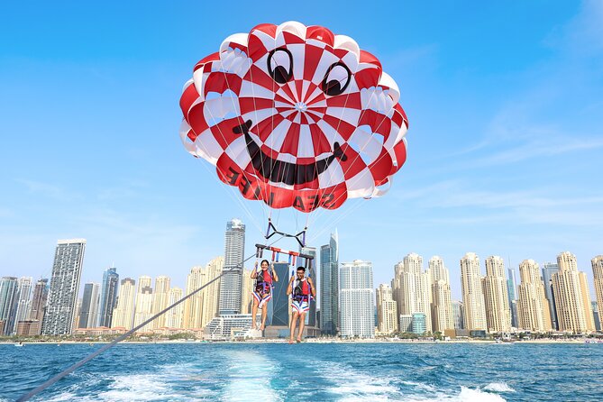 Parasailing in Dubai with Palm Jumeirah and JBR Beach views - Who will enjoy this Dubai activity most