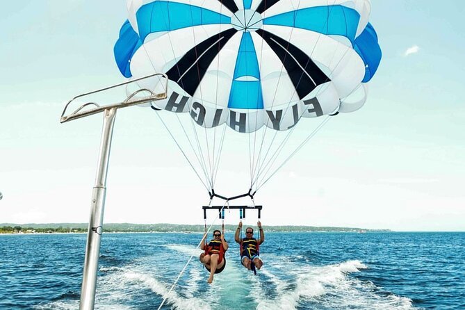 Parasailing, Sea Tubing & Jet Ski from Montego Bay- Private tour - Sea tubing behind a speedboat