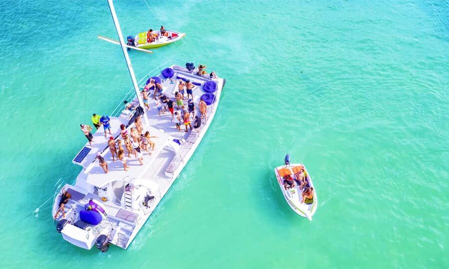 Punta Cana Area: Party Cruise with Parasailing and Open Bar - Parasailing above the Dominican Republic