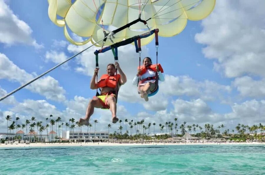 Punta Cana: Parasailing Experience with Round-Trip Transfer - Boarding the boat and heading over the Caribbean Sea