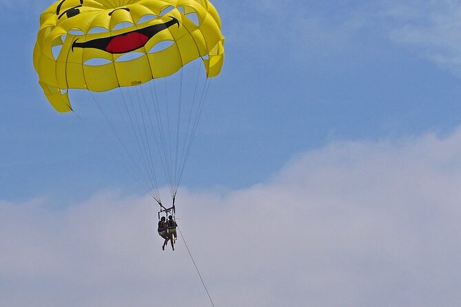 Santorini: Parasailing Flight Experience at Black Beach - Flying above Perivolos Beach