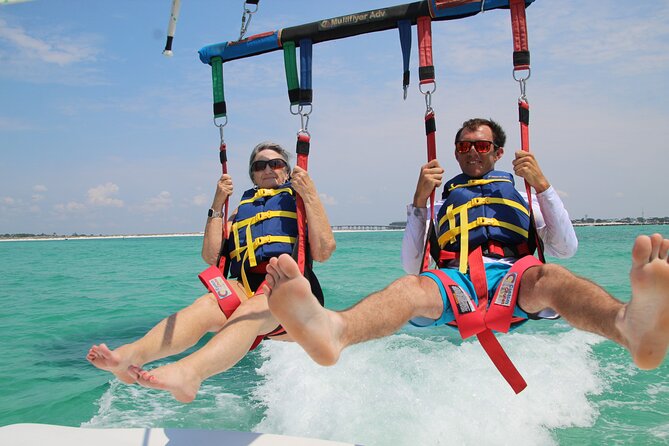 Sun Dogs Parasailing Tour in Destin Florida - The first ride out, with dolphins in the harbor