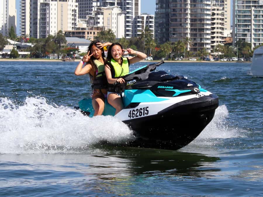 Surfers Paradise: Parasailing and Jet Ski Tour Package - Making the move from Surfers Paradise to Main Beach