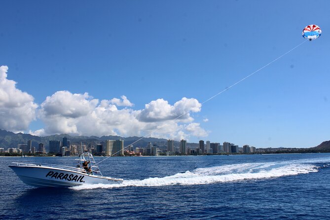 Waikiki and Diamond Head Parasailing Experience - The crew creates the mood