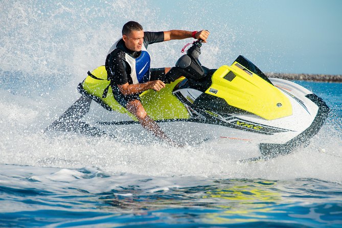 Waters Sport Package with 40 min. Jet Ski and Parasailing 1 person - The handoff from jet skis to parasailing